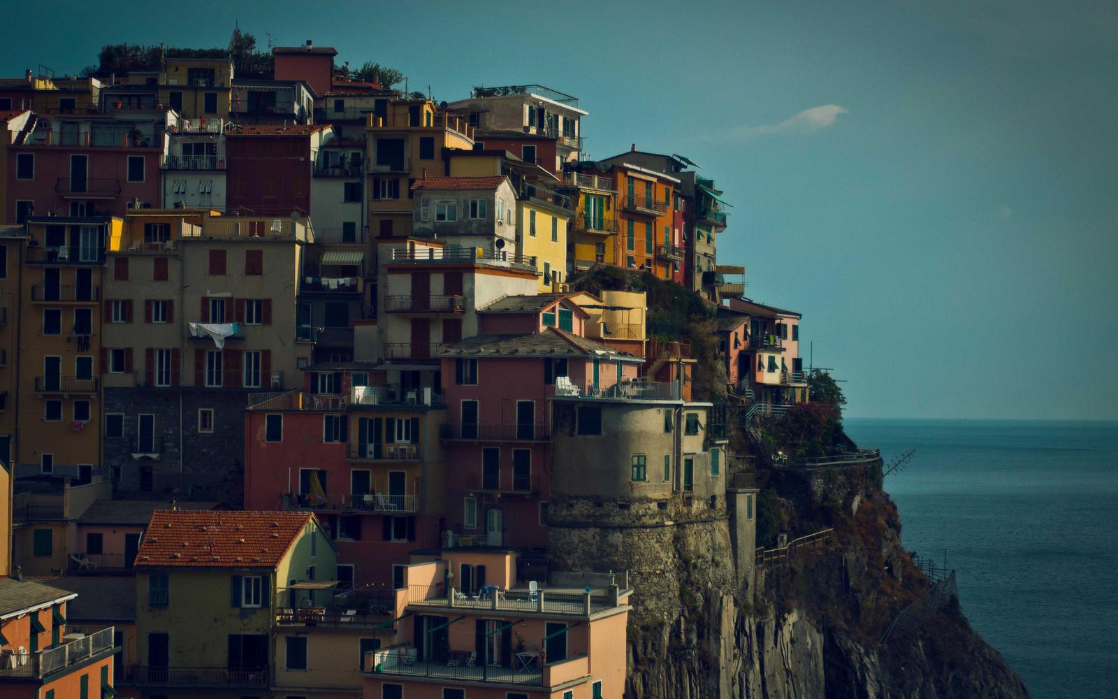 Archival box labeled with a quarter and a build number, studio shelf